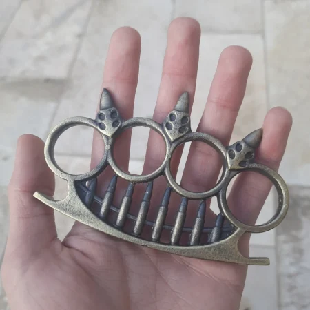 پنجه بوکس طرح تیر تفنگ رنگ زرد قلم